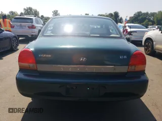 1999 Hyundai Sonata GLS with VIN KMHWF35V9XA100869, listed as a Copart auction lot 68219694 with 144,388 mi miles and Non Repairable. Bid and sale history available at carsss.com. Image 6.