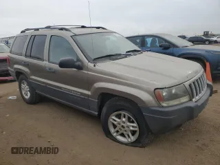 2004 Jeep Grand Cherokee Laredo with VIN 1J4GW48N94C408435, listed as a Copart auction lot 83909444 with Not provided miles and Clean title. Bid and sale history available at DreamBid. Image 4.
