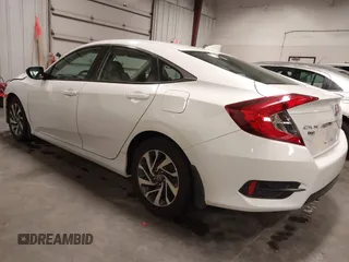 2018 Honda Civic EX with VIN 19XFC2F74JE005647, listed as a IAAI auction lot 41938607 with 90,263 mi miles and . Bid and sale history available at DreamBid. Image 3.
