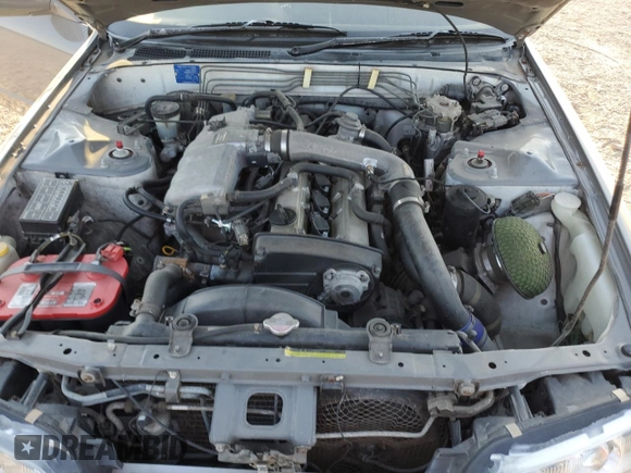 1992 Nissan Skyline z VIN HNR32035831, wystawiony jako Copart lot #74228974 z przebiegiem 49 082 mil mil oraz Szkoda całkowita • Salvage title. Historia ofert i sprzedaży dostępna na DreamBid. Obrazek 11.