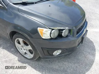 2016 Chevrolet Sonic LTZ z VIN 1G1JE5SB5G4137710, wystawiony jako IAAI lot #42131625 z przebiegiem 152 941 mil mil oraz . Historia ofert i sprzedaży dostępna na DreamBid. Obrazek 19.