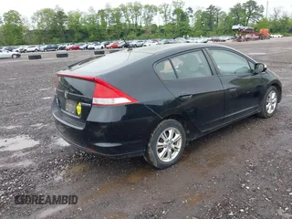 2010 Honda Insight EX z VIN JHMZE2H79AS010908, wystawiony jako IAAI lot #42263658 z przebiegiem 140 999 mil mil oraz . Historia ofert i sprzedaży dostępna na DreamBid. Obrazek 4.