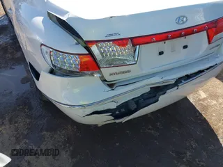 2007 Hyundai Azera SE z VIN KMHFC46F57A210341, wystawiony jako IAAI lot #41729427 z przebiegiem 113 301 mil mil oraz . Historia ofert i sprzedaży dostępna na DreamBid. Obrazek 17.
