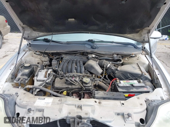 2002 Mercury Sable GS z VIN 1MEFM50U52G650143, wystawiony jako IAAI lot #42525337 z przebiegiem 151 079 mil mil oraz . Historia ofert i sprzedaży dostępna na DreamBid. Obrazek 10.