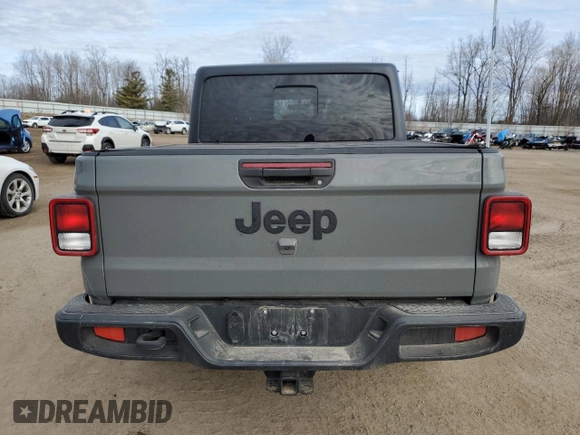 2023 Jeep Gladiator Willys z VIN 1C6HJTAG0PL507803, wystawiony jako Copart lot #48526875 z przebiegiem 51 811 mil mil oraz Czysty tytuł • Clean title. Historia ofert i sprzedaży dostępna na DreamBid. Obrazek 6.
