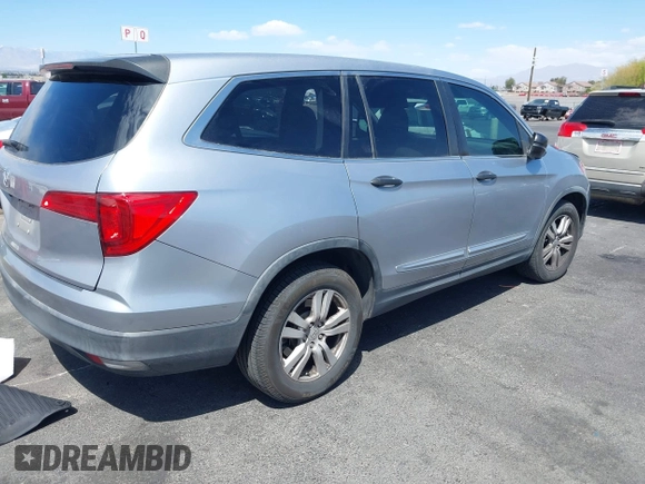 2016 Honda Pilot LX with VIN 5FNYF5H10GB044006, listed as a IAAI auction lot 42075404 with 129,642 mi miles and . Bid and sale history available at DreamBid. Image 4.