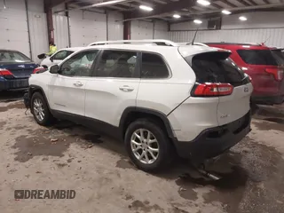 2016 Jeep Cherokee Latitude with VIN 1C4PJMCB1GW119621, listed as a IAAI auction lot 41310872 with 123,841 mi miles. Bid and sale history available at carsss.com. Image 3.