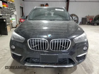 2018 BMW X1 xDrive28i with VIN WBXHT3C37J5L30341, listed as a Copart auction lot 42691505 with 84,523 mi miles and Salvage Title. Bid and sale history available at carsss.com. Image 5.