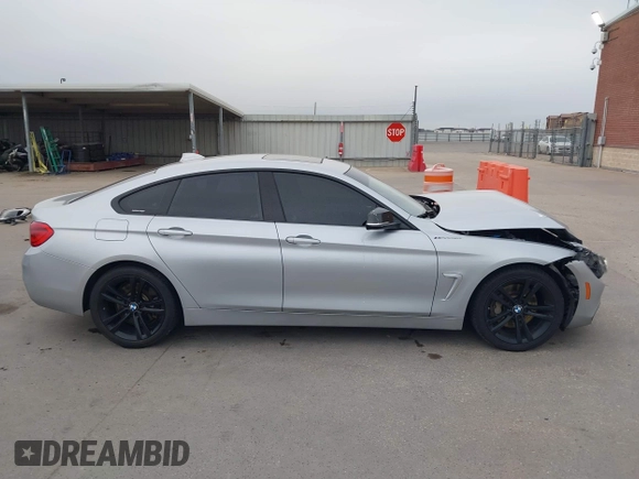 2018 BMW 4 Series 440i with VIN WBA4J5C57JBF07924, listed as a IAAI auction lot 41595682 with 75,121 mi miles and . Bid and sale history available at DreamBid. Image 13.