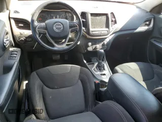 2015 Jeep Cherokee Latitude with VIN 1C4PJLCB5FW731796, listed as a Copart auction lot 49316845 with 129,973 mi miles and Salvage Title. Bid and sale history available at carsss.com. Image 8.