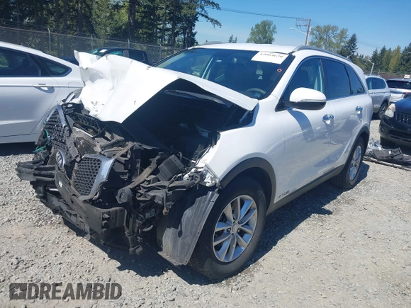 2016 Kia Sorento LX z VIN 5XYPGDA59GG025432, wystawiony jako IAAI lot #42064630 z przebiegiem 170 591 mil mil oraz . Historia ofert i sprzedaży dostępna na DreamBid. Obrazek 2.