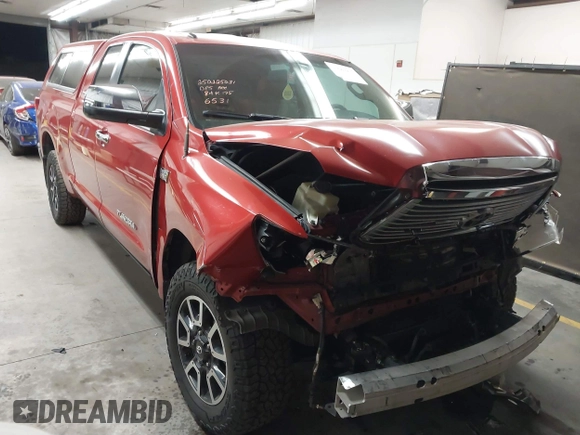 2011 Toyota Tundra 4WD Truck LTD with VIN 5TFBY5F12BX166531, listed as a IAAI auction lot 41680915 with 164,314 mi miles. Bid and sale history available at carsss.com. Image 1.