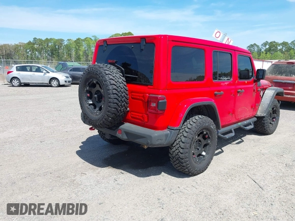 2020 Jeep Wrangler Unlimited Rubicon with VIN 1C4HJXFG9LW106607, listed as a IAAI auction lot 41908295 with 71,083 mi miles and . Bid and sale history available at DreamBid. Image 4.
