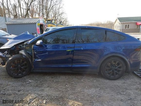 2023 Tesla Model X with VIN 7SAXCDE52PF399834, listed as a IAAI auction lot 41783696 with NaN miles. Bid and sale history available at carsss.com. Image 13.