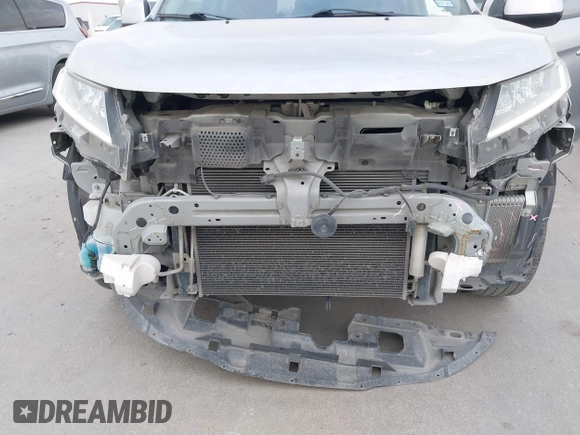 2021 Mitsubishi Outlander ES z VIN JA4APUAU1MU014152, wystawiony jako IAAI lot #41689335 z przebiegiem 112 374 mil mil oraz . Historia ofert i sprzedaży dostępna na DreamBid. Obrazek 18.