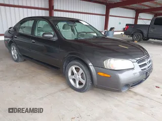 2002 Nissan Maxima GLE z VIN JN1DA31D32T402679, wystawiony jako IAAI lot #41831276 z przebiegiem 200 457 mil mil oraz . Historia ofert i sprzedaży dostępna na DreamBid. Obrazek 1.