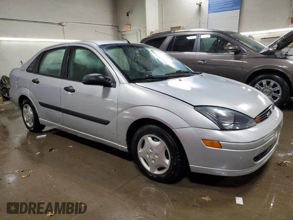 2003 Ford Focus LX z VIN 1FAFP33P03W313279, wystawiony jako Copart lot #89271495 z przebiegiem 152 672 mil mil oraz Szkoda całkowita • Salvage title. Historia ofert i sprzedaży dostępna na DreamBid. Obrazek 4.