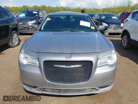 2016 Chrysler 300 Anniversary Edition with VIN 2C3CCAAG4GH238255, listed as a IAAI auction lot 42163236 with 253,452 mi miles and . Bid and sale history available at DreamBid. Image 12.