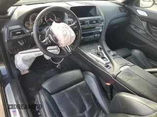2016 BMW M6 z VIN WBS6G9C57GD932144, wystawiony jako Copart lot #72273744 z przebiegiem 71 614 mil mil oraz Szkoda całkowita • Salvage title. Historia ofert i sprzedaży dostępna na DreamBid. Obrazek 8.