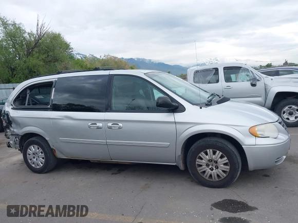 2007 Chrysler Town & Country with VIN 2A4GP44R27R191148, listed as a IAAI auction lot 42171218 with 150,670 mi miles and . Bid and sale history available at DreamBid. Image 14.