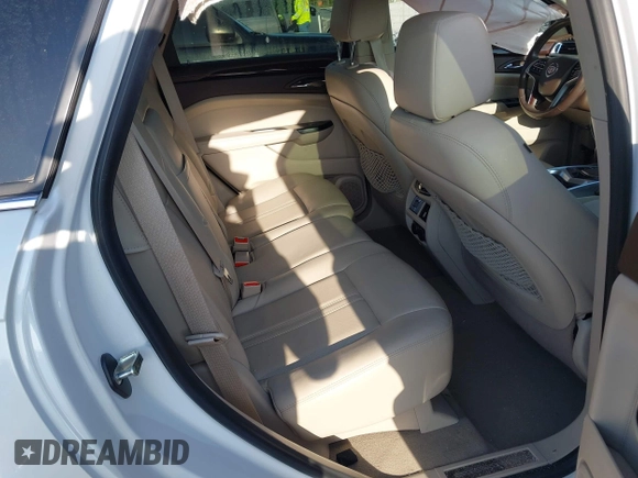 2015 Cadillac SRX Premium Collection with VIN 3GYFNDE32FS530357, listed as a IAAI auction lot 41976585 with 92,335 mi miles and . Bid and sale history available at carsss.com. Image 8.