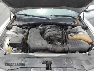 2012 Dodge Charger SE with VIN 2C3CDXBG4CH203207, listed as a Copart auction lot 56910395 with 156,016 mi miles and Salvage Title. Bid and sale history available at DreamBid. Image 11.