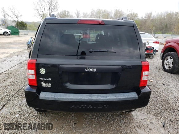 2009 Jeep Patriot Sport z VIN 1J4FF28B19D107312, wystawiony jako Copart lot #52885605 z przebiegiem 149 985 mil mil oraz Nie do naprawy • Non repairable. Historia ofert i sprzedaży dostępna na DreamBid. Obrazek 6.