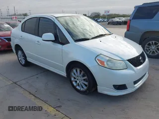2009 Suzuki SX4 Man Sport FWD with VIN JS2YC414696201291, listed as a IAAI auction lot 41274116 with 120,233 mi miles. Bid and sale history available at carsss.com. Image 1.