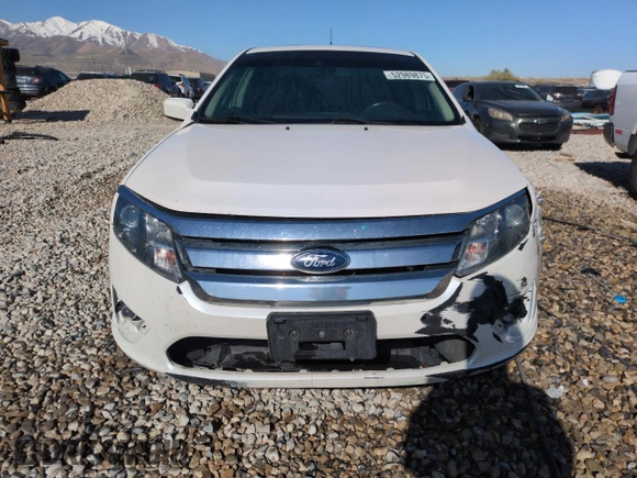 2012 Ford Fusion SEL z VIN 3FAHP0JA7CR434058, wystawiony jako Copart lot #52989875 z przebiegiem 109 914 mil mil oraz Szkoda całkowita • Salvage title. Historia ofert i sprzedaży dostępna na DreamBid. Obrazek 5.