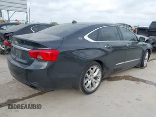 2014 Chevrolet Impala LTZ with VIN 2G1155S31E9101628, listed as a IAAI auction lot 42064481 with 148,511 mi miles and . Bid and sale history available at DreamBid. Image 4.