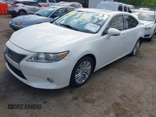 2014 Lexus ES 330 with VIN JTHBK1GG0E2137347, listed as a IAAI auction lot 42128381 with 96,612 mi miles and . Bid and sale history available at DreamBid. Image 2.