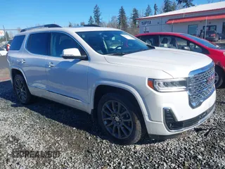 2021 GMC Acadia Denali z VIN 1GKKNXLS6MZ100626, wystawiony jako IAAI lot #41522158 z przebiegiem 54 012 mil mil oraz . Historia ofert i sprzedaży dostępna na DreamBid. Obrazek 1.