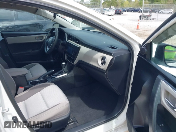 2019 Toyota Corolla L with VIN 5YFBURHE8KP949824, listed as a IAAI auction lot 41904385 with 112,054 mi miles. Bid and sale history available at carsss.com. Image 5.