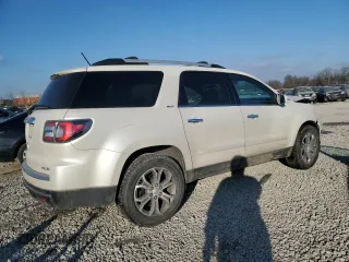 2014 GMC Acadia SLT with VIN 1GKKVSKD9EJ256293, listed as a Copart auction lot 42230505 with 129,458 mi miles and Salvage Title. Bid and sale history available at carsss.com. Image 3.