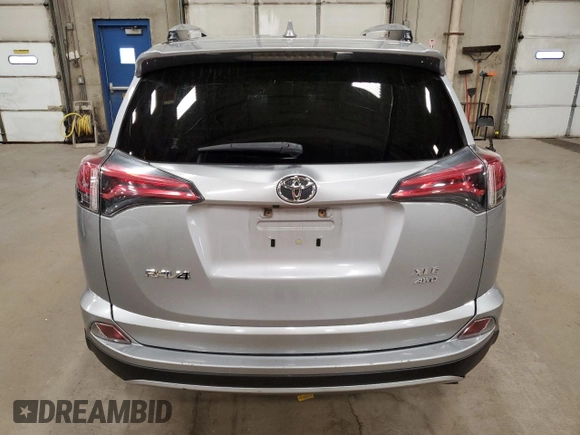 2018 Toyota RAV4 XLE with VIN JTMRFREV2JD234942, listed as a Copart auction lot 54136645 with Not Provided miles and Salvage Title. Bid and sale history available at DreamBid. Image 6.