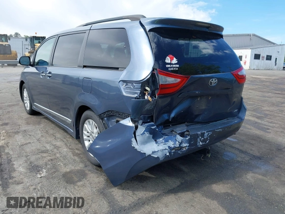 2016 Toyota Sienna XLE with VIN 5TDYK3DC0GS766059, listed as a IAAI auction lot 42214738 with 143,001 mi miles and . Bid and sale history available at DreamBid. Image 3.