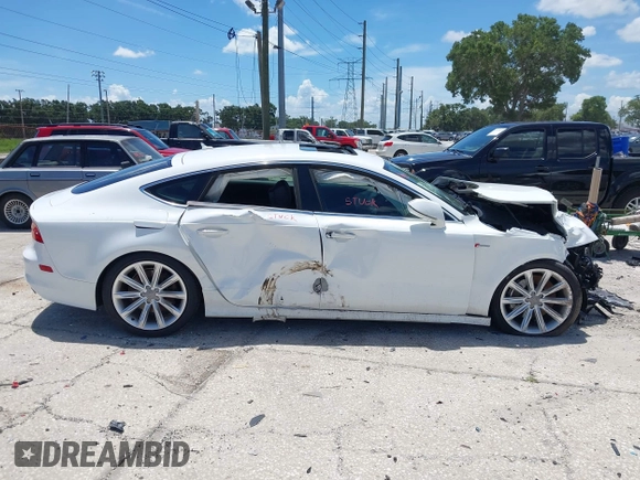 2012 Audi A7 Premium Plus with VIN WAUSGAFC0CN010138, listed as a IAAI auction lot 42532785 with 198,218 mi miles and . Bid and sale history available at DreamBid. Image 13.