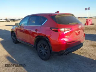2022 Mazda CX-5 2.5 Turbo with VIN JM3KFBAY4N0564000, listed as a IAAI auction lot 41076013 with 25,106 mi miles and . Bid and sale history available at carsss.com. Image 3.