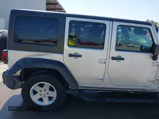 2010 Jeep Wrangler Unlimited Sport with VIN 1J4BA3H17AL211887, listed as a IAAI auction lot 41778324 with 185,626 mi miles. Bid and sale history available at carsss.com. Image 18.