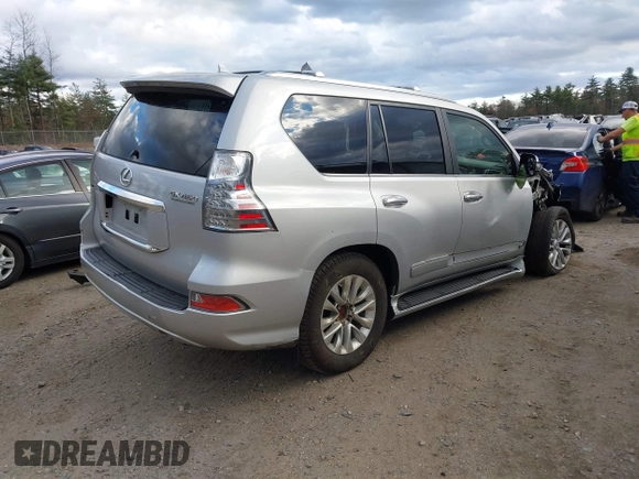 2014 Lexus GX with VIN JTJBM7FX3E5084445, listed as a IAAI auction lot 40640676 with 77,486 mi miles. Bid and sale history available at carsss.com. Image 4.