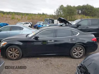 2012 Infiniti M with VIN JN1BY1AP5CM333975, listed as a IAAI auction lot 41701701 with 130,828 mi miles and . Bid and sale history available at DreamBid. Image 14.