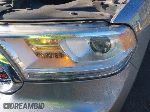 2014 Dodge Durango Citadel z VIN 1C4SDJET4EC331577, wystawiony jako IAAI lot #40923796 z przebiegiem 83 154 mil mil oraz . Historia ofert i sprzedaży dostępna na DreamBid. Obrazek 6.
