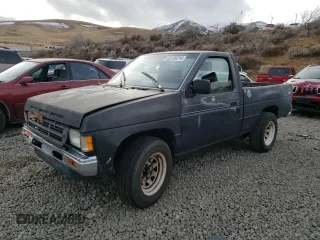 1991 Nissan Frontier with VIN 1N6SD11S9MC419923, listed as a Copart auction lot 85189314 with 245,003 mi miles and Salvage title. Bid and sale history available at DreamBid. Image 1.