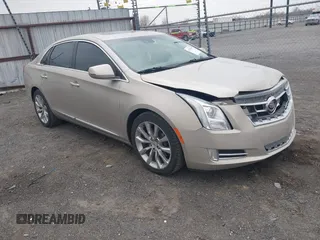 2013 Cadillac XTS Platinum z VIN 2G61U5S38D9134699, wystawiony jako IAAI lot #41797802 z przebiegiem 74 789 mil mil oraz . Historia ofert i sprzedaży dostępna na DreamBid. Obrazek 1.