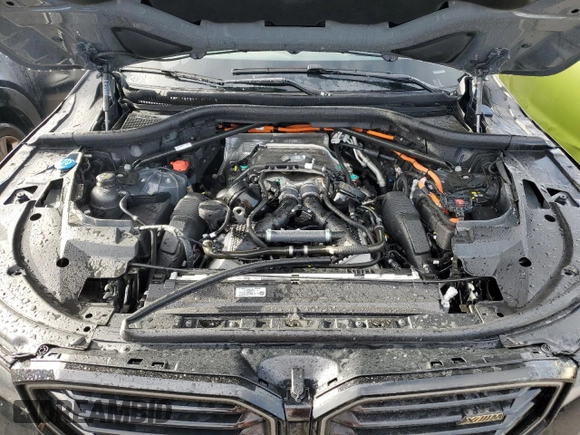 2024 BMW XM z VIN 5YM23CS06R9U92810, wystawiony jako Copart lot #75401504 z przebiegiem 6181 mil mil oraz Nie do naprawy. Historia ofert i sprzedaży dostępna na DreamBid. Obrazek 12.