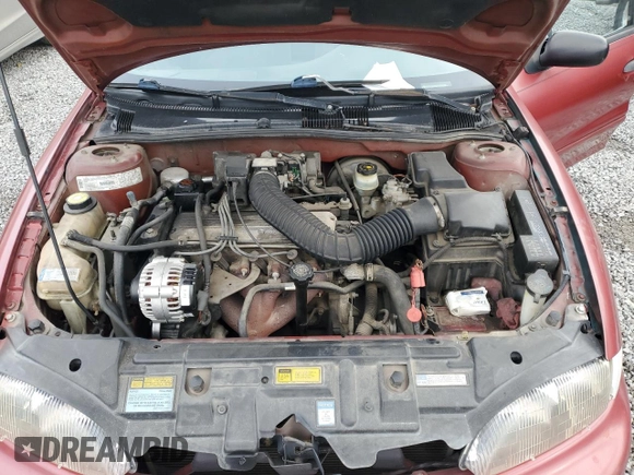 1997 Chevrolet Cavalier LS z VIN 1G1JF524XV7323656, wystawiony jako Copart lot #85275984 z przebiegiem 109 320 mil mil oraz Szkoda całkowita • Salvage title. Historia ofert i sprzedaży dostępna na DreamBid. Obrazek 11.
