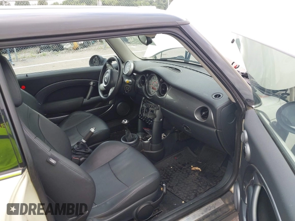 2006 MINI Hardtop with VIN WMWRC33566TK73763, listed as a IAAI auction lot 42782654 with 103,751 mi miles and . Bid and sale history available at DreamBid. Image 5.