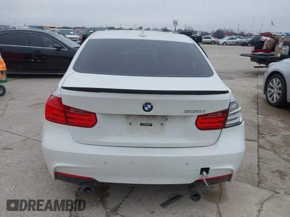 2013 BMW 3 Series 335i with VIN WBA3A9C50DF477209, listed as a IAAI auction lot 41595369 with 99,241 mi miles. Bid and sale history available at carsss.com. Image 15.