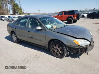 2003 Ford Taurus SEL Deluxe with VIN 1FAFP56S93G222243, listed as a Copart auction lot 46496165 with 193,282 mi miles and Salvage Title. Bid and sale history available at DreamBid. Image 4.