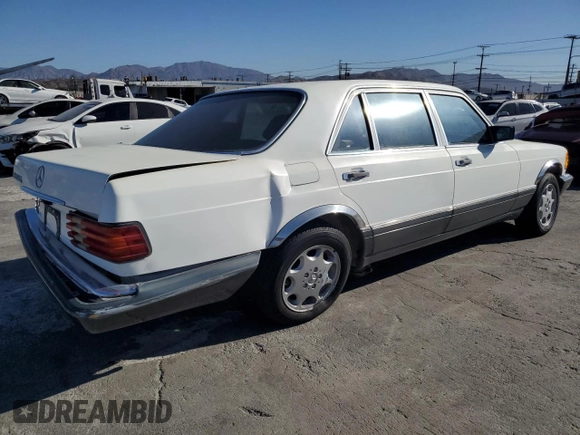 1986 Mercedes-Benz 560 with VIN WDBCA39D6GA238259, listed as a Copart auction lot 89204495 with 106,746 mi miles and Salvage Title. Bid and sale history available at DreamBid. Image 3.